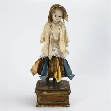 Rare "poupée de voyance" sur socle en bois