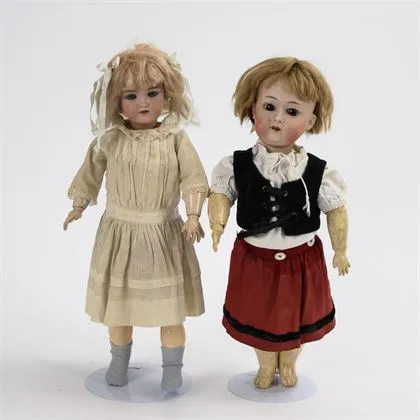 2 blonde porseleinen hoofdpoppen