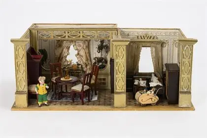 Klein poppenhuis met erker