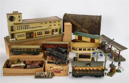 Important lot de trains Märklin dans une valise de voyage historique