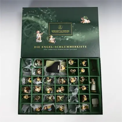 Petrus en chef d'orchestre et 27 anges musiciens dans "Engel-Schlummerkiste". Wendt & Kühn, Grünhainichen