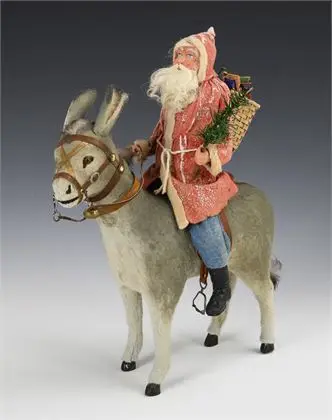 Père Noël à cheval sur un âne