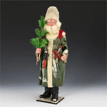 Boîte à bonbons Père Noël avec manteau vert, dans sa boîte d'origine. Petzold & Aulhorn AG, Dresde