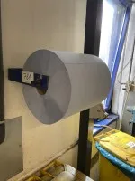 1 papierafroller - ophalen na goedkeuring −