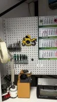 1 corner workbench with shelving, lighting, perforated tool panels and power distribution