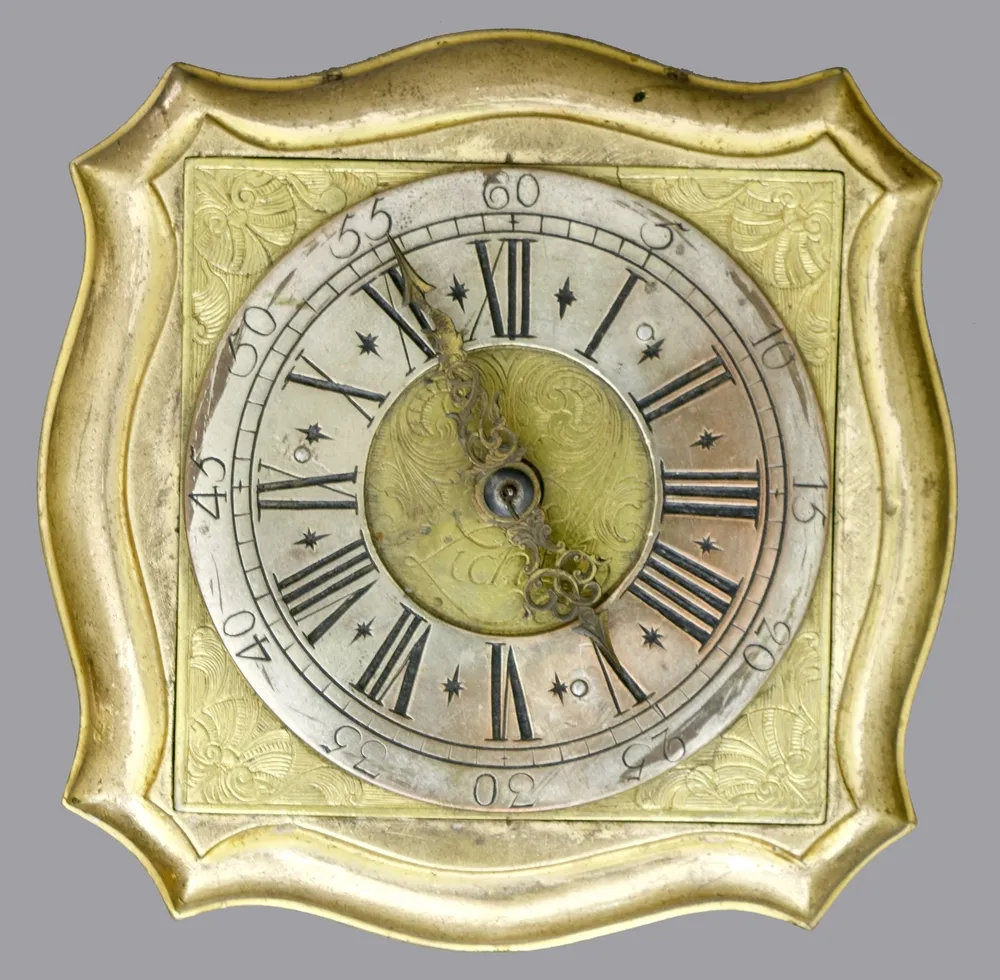 Clock, table clock or horizontal clock, bronze, fire-gilt, Poland, 1st quarter 18th century, square, serpentine, side bezels, corner masks and chapter ring, silvered