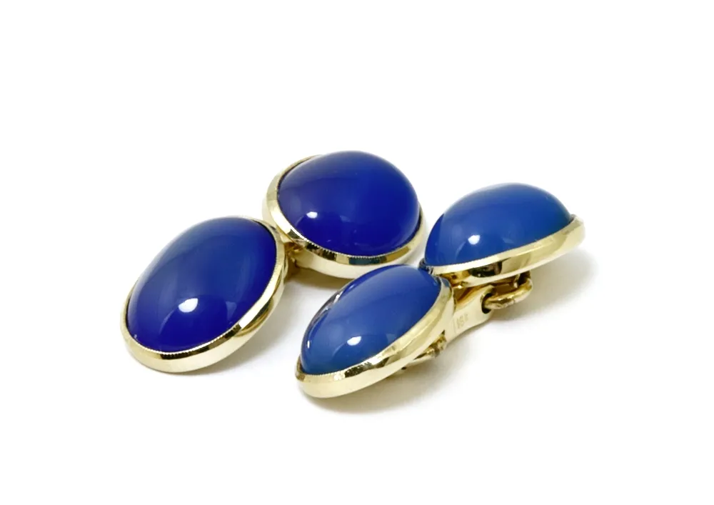 Cufflinks, 750 yellow gold assembly, one pair with blue oval topaz cabochon, gross weight 10.5 g.