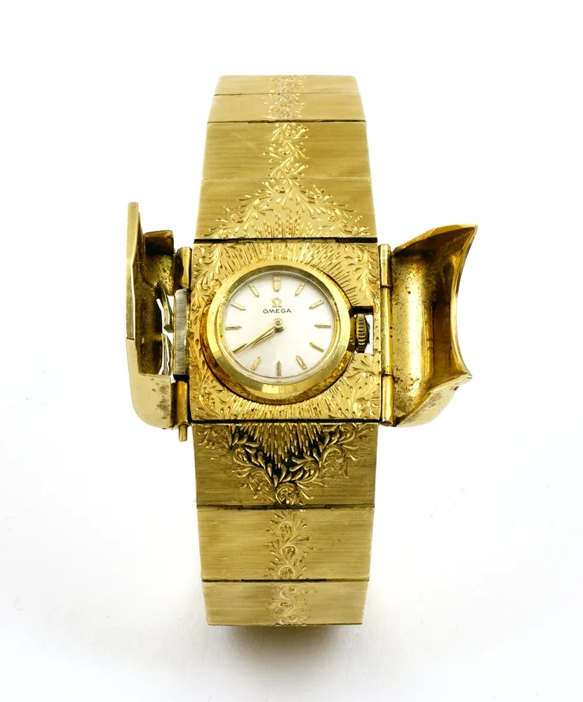 Uhr, Armbanduhr, 750 GG, Omega, Schweiz, um 1960 Omega Uhrwerk in Armband eingearbeitet