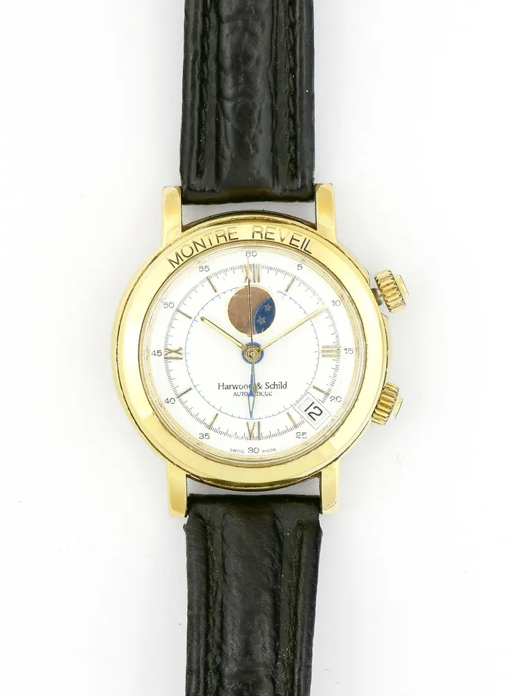 Horloge, polshorloge, Harwood & Schild, Montre Reveil, circa 1990, ronde kast, diameter ca. 38 mm. Witte wijzerplaat met Romeinse cijfers. Verguld. Automatisch. Wekker, maanfase, datum, chronograaf. Limited edition nummer 736 van 1999. Leren band. Loopt, duurzaamheid niet getest. Glas met gebruikssporen.