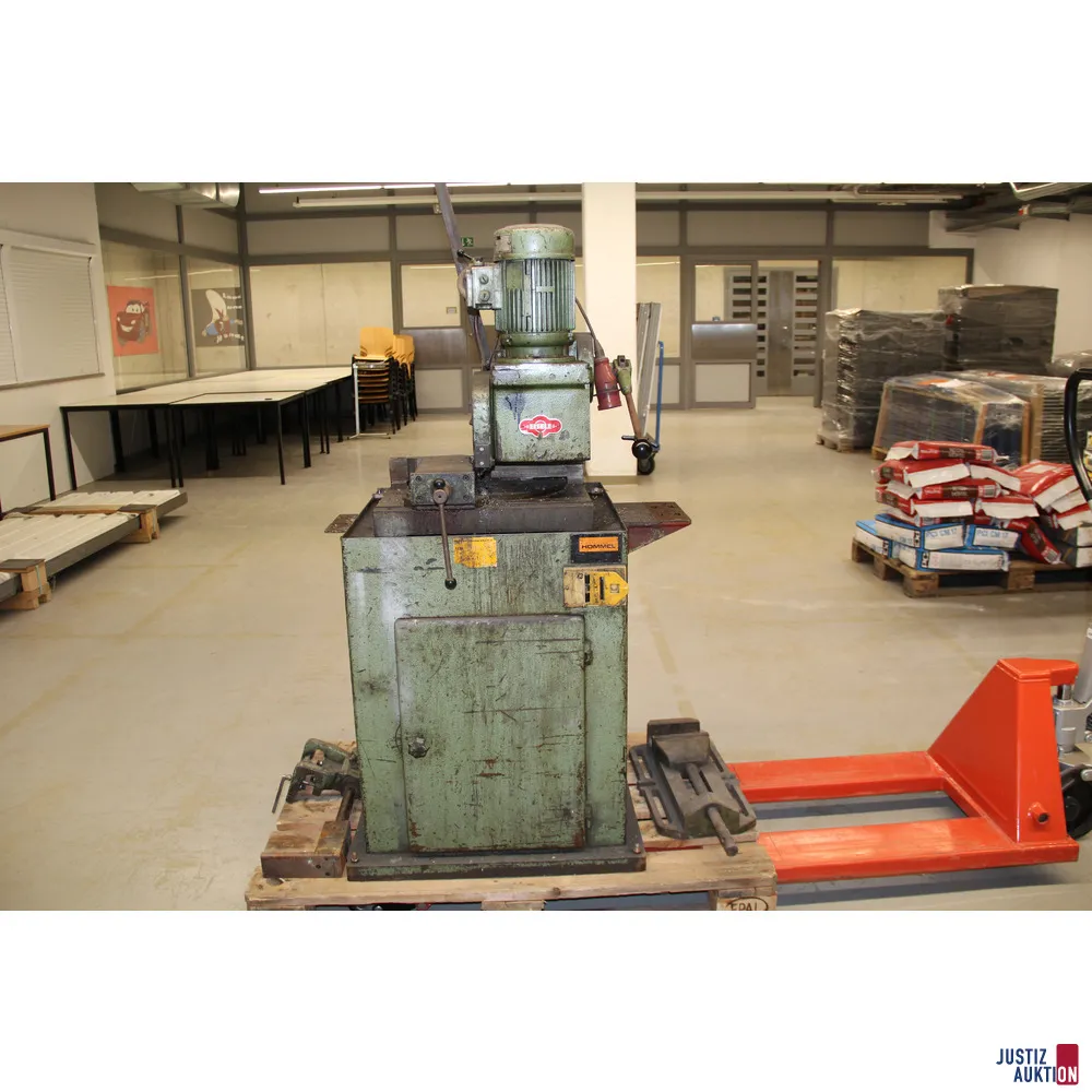 Metal circular saw with roller conveyor