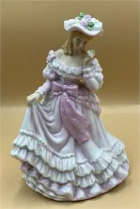 1 porcelain figurine with music box - height 19 cm