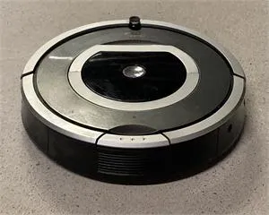 1 robot aspirateur - iRobot Roomba