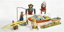Lot de jouets en fer-blanc