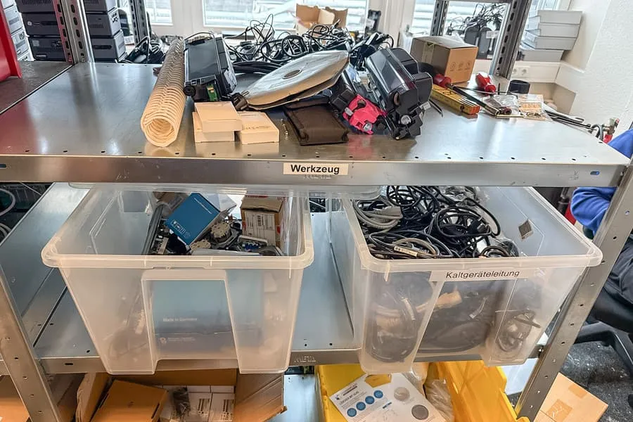 Contents of 2 shelf levels: miscellaneous